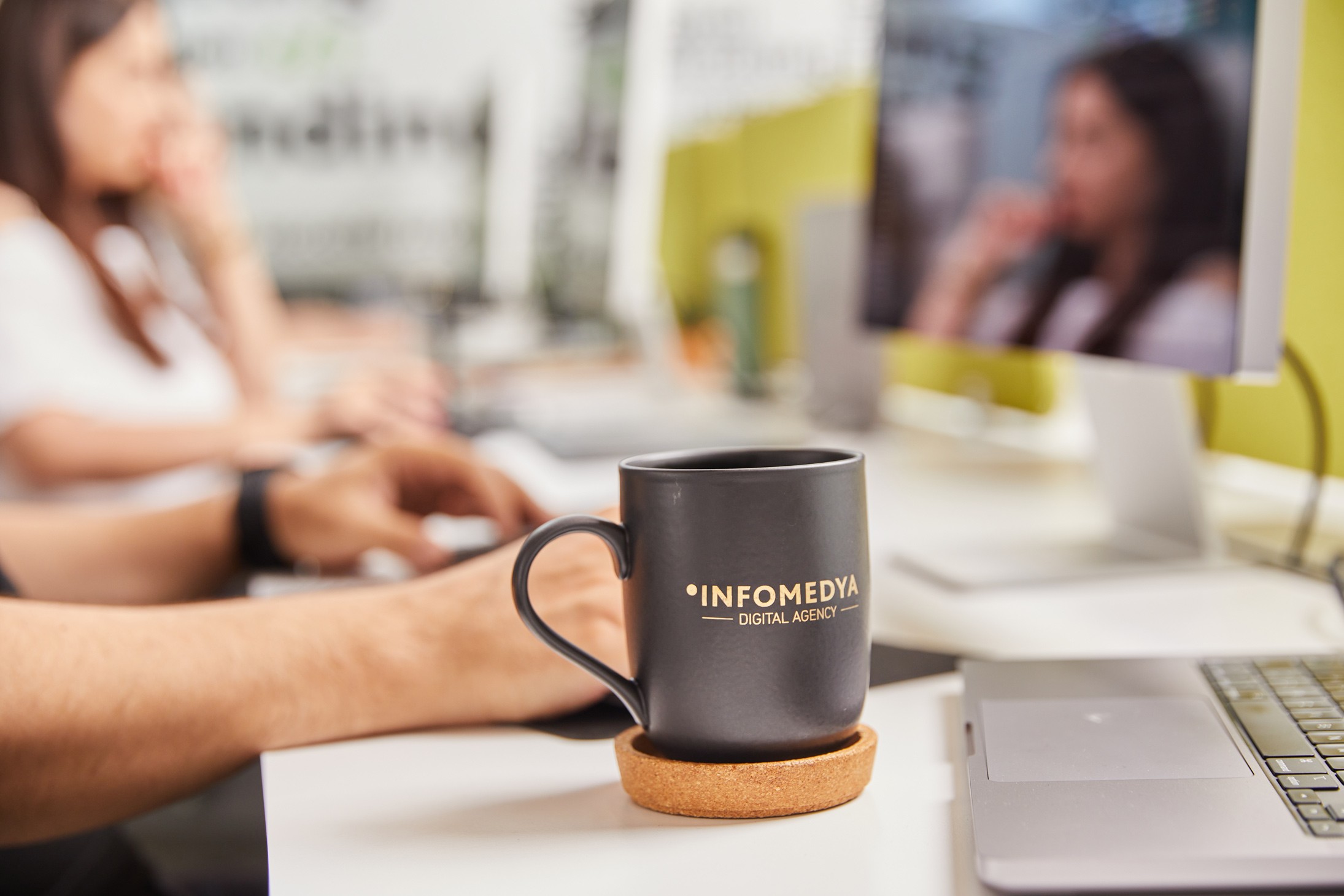 Infomedia Agency's coffee cup